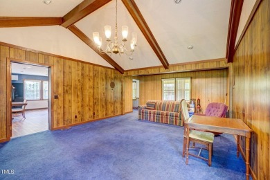 This home offers a unique layout and plenty of potential for on Carolina Trace Country Club in North Carolina - for sale on GolfHomes.com, golf home, golf lot