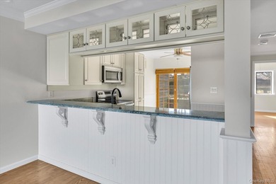 This sun-drenched 2-bedroom, 2-bathroom condo offers on Baiting Hollow Club in New York - for sale on GolfHomes.com, golf home, golf lot