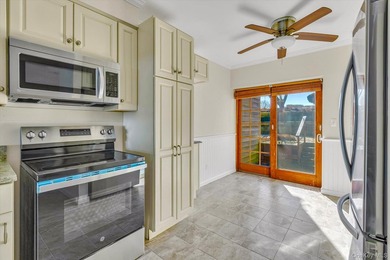 This sun-drenched 2-bedroom, 2-bathroom condo offers on Baiting Hollow Club in New York - for sale on GolfHomes.com, golf home, golf lot