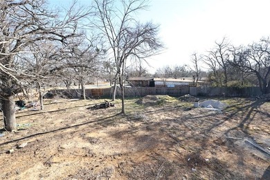 Welcome to this stately Colonial-style home nestled in the heart on Meadowbrook Golf Course in Texas - for sale on GolfHomes.com, golf home, golf lot