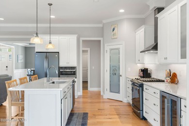 This beautiful coastal home located in St. James Plantation is on Members Club At St. James Plantation in North Carolina - for sale on GolfHomes.com, golf home, golf lot