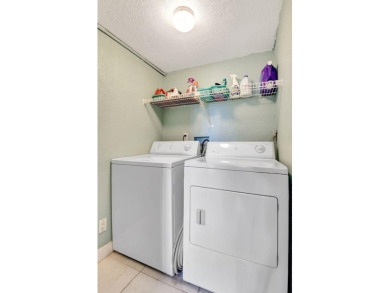 VIEWS FOR DAYS!!  This 2nd Floor End-Unit Condo Has The BEST on Indian Spring Golf and Country Club in Florida - for sale on GolfHomes.com, golf home, golf lot
