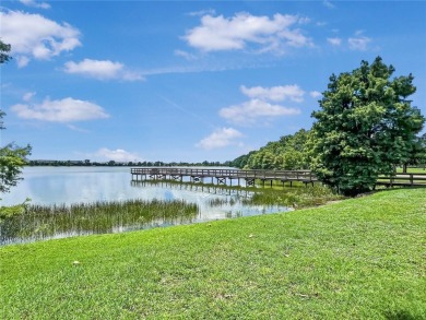 One or more photo(s) has been virtually staged. UPGRADED AND on River Strand Golf and Country Club At Heritage Harbour  in Florida - for sale on GolfHomes.com, golf home, golf lot