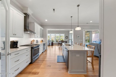 This beautiful coastal home located in St. James Plantation is on Members Club At St. James Plantation in North Carolina - for sale on GolfHomes.com, golf home, golf lot