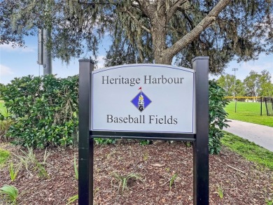 One or more photo(s) has been virtually staged. UPGRADED AND on River Strand Golf and Country Club At Heritage Harbour  in Florida - for sale on GolfHomes.com, golf home, golf lot