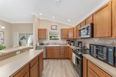 NO BOND! NEW ROOF! NEW A/C! GOLF CART GARAGE! NEUTRAL FRESH on Egret Championship Golf Course in Florida - for sale on GolfHomes.com, golf home, golf lot