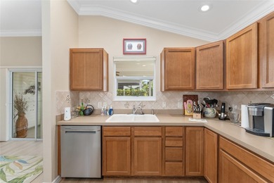 NO BOND! NEW ROOF! NEW A/C! GOLF CART GARAGE! NEUTRAL FRESH on Egret Championship Golf Course in Florida - for sale on GolfHomes.com, golf home, golf lot