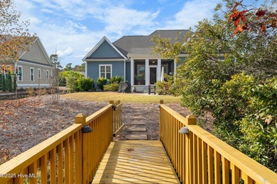 This beautiful coastal home located in St. James Plantation is on Members Club At St. James Plantation in North Carolina - for sale on GolfHomes.com, golf home, golf lot