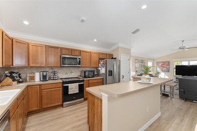 NO BOND! NEW ROOF! NEW A/C! GOLF CART GARAGE! NEUTRAL FRESH on Egret Championship Golf Course in Florida - for sale on GolfHomes.com, golf home, golf lot