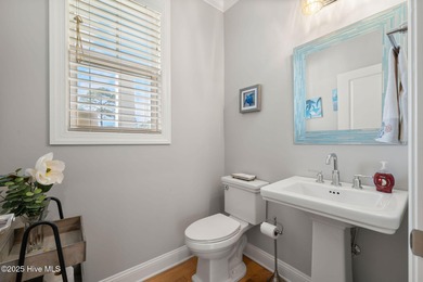 This beautiful coastal home located in St. James Plantation is on Members Club At St. James Plantation in North Carolina - for sale on GolfHomes.com, golf home, golf lot