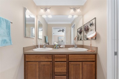 NO BOND! NEW ROOF! NEW A/C! GOLF CART GARAGE! NEUTRAL FRESH on Egret Championship Golf Course in Florida - for sale on GolfHomes.com, golf home, golf lot