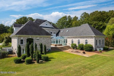 Welcome to your coastal dream retreat in Hertford, North on Sound Golf Links at Albemarle Plantation in North Carolina - for sale on GolfHomes.com, golf home, golf lot