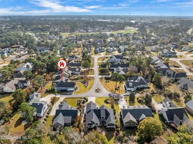 This beautiful coastal home located in St. James Plantation is on Members Club At St. James Plantation in North Carolina - for sale on GolfHomes.com, golf home, golf lot