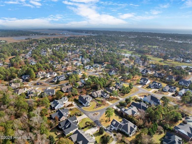 This beautiful coastal home located in St. James Plantation is on Members Club At St. James Plantation in North Carolina - for sale on GolfHomes.com, golf home, golf lot
