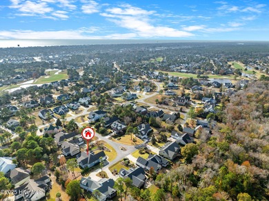 This beautiful coastal home located in St. James Plantation is on Members Club At St. James Plantation in North Carolina - for sale on GolfHomes.com, golf home, golf lot