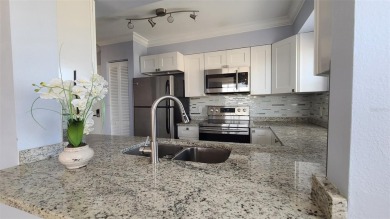 Bright and welcoming 1 bed, 1.5 bath condo in the desirable on Feather Sound Country Club in Florida - for sale on GolfHomes.com, golf home, golf lot