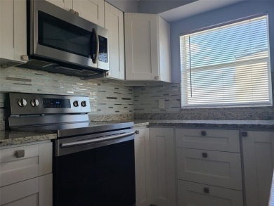 Bright and welcoming 1 bed, 1.5 bath condo in the desirable on Feather Sound Country Club in Florida - for sale on GolfHomes.com, golf home, golf lot