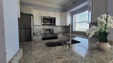 Bright and welcoming 1 bed, 1.5 bath condo in the desirable on Feather Sound Country Club in Florida - for sale on GolfHomes.com, golf home, golf lot