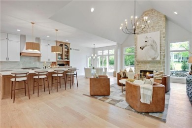 This gorgeous complete remodel by Evan Talan homes shows like a on Loch Lloyd Country Club in Missouri - for sale on GolfHomes.com, golf home, golf lot