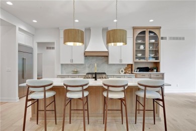 This gorgeous complete remodel by Evan Talan homes shows like a on Loch Lloyd Country Club in Missouri - for sale on GolfHomes.com, golf home, golf lot