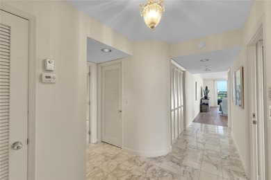 TURN-KEY FURNISHED beach-to-bay corner residence offering 2 on Links on Longboat Golf Club in Florida - for sale on GolfHomes.com, golf home, golf lot