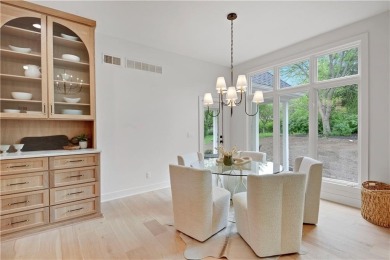 This gorgeous complete remodel by Evan Talan homes shows like a on Loch Lloyd Country Club in Missouri - for sale on GolfHomes.com, golf home, golf lot