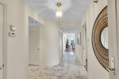 TURN-KEY FURNISHED beach-to-bay corner residence offering 2 on Links on Longboat Golf Club in Florida - for sale on GolfHomes.com, golf home, golf lot