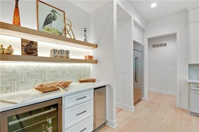 This gorgeous complete remodel by Evan Talan homes shows like a on Loch Lloyd Country Club in Missouri - for sale on GolfHomes.com, golf home, golf lot