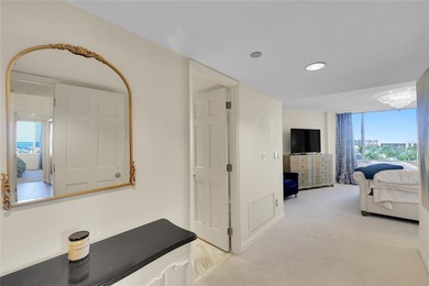 TURN-KEY FURNISHED beach-to-bay corner residence offering 2 on Links on Longboat Golf Club in Florida - for sale on GolfHomes.com, golf home, golf lot