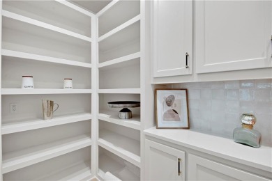This gorgeous complete remodel by Evan Talan homes shows like a on Loch Lloyd Country Club in Missouri - for sale on GolfHomes.com, golf home, golf lot
