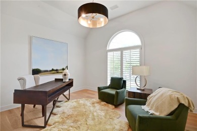 This gorgeous complete remodel by Evan Talan homes shows like a on Loch Lloyd Country Club in Missouri - for sale on GolfHomes.com, golf home, golf lot