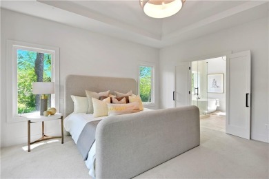 This gorgeous complete remodel by Evan Talan homes shows like a on Loch Lloyd Country Club in Missouri - for sale on GolfHomes.com, golf home, golf lot