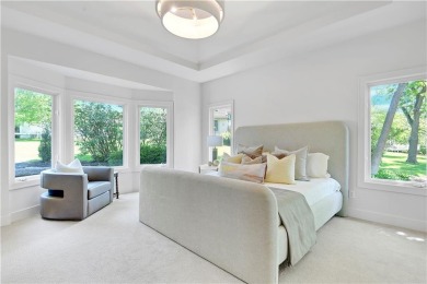 This gorgeous complete remodel by Evan Talan homes shows like a on Loch Lloyd Country Club in Missouri - for sale on GolfHomes.com, golf home, golf lot
