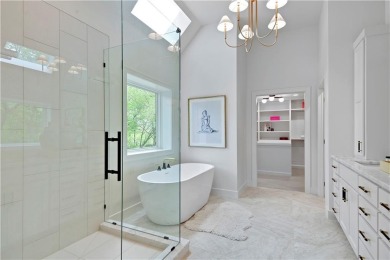 This gorgeous complete remodel by Evan Talan homes shows like a on Loch Lloyd Country Club in Missouri - for sale on GolfHomes.com, golf home, golf lot