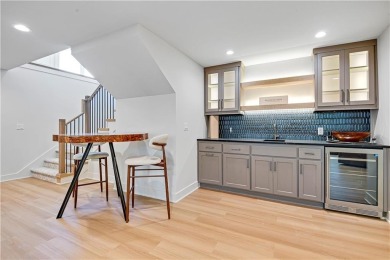 This gorgeous complete remodel by Evan Talan homes shows like a on Loch Lloyd Country Club in Missouri - for sale on GolfHomes.com, golf home, golf lot
