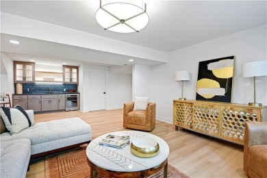 This gorgeous complete remodel by Evan Talan homes shows like a on Loch Lloyd Country Club in Missouri - for sale on GolfHomes.com, golf home, golf lot