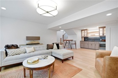 This gorgeous complete remodel by Evan Talan homes shows like a on Loch Lloyd Country Club in Missouri - for sale on GolfHomes.com, golf home, golf lot