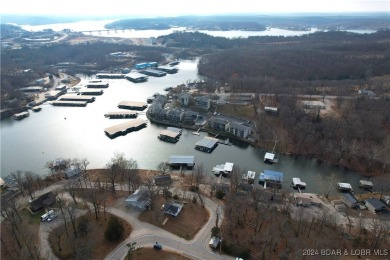 Unique and rare lake property minutes from restaurants, shopping on Tan-Tar-A Golf Club in Missouri - for sale on GolfHomes.com, golf home, golf lot