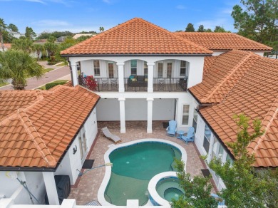 This exquisite custom home, nestled in the secure and golf on Regatta Bay Golf and Country Club in Florida - for sale on GolfHomes.com, golf home, golf lot
