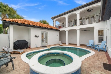 This exquisite custom home, nestled in the secure and golf on Regatta Bay Golf and Country Club in Florida - for sale on GolfHomes.com, golf home, golf lot