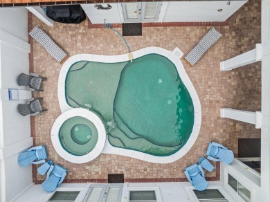 This exquisite custom home, nestled in the secure and golf on Regatta Bay Golf and Country Club in Florida - for sale on GolfHomes.com, golf home, golf lot