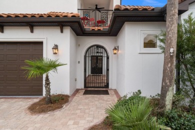 This exquisite custom home, nestled in the secure and golf on Regatta Bay Golf and Country Club in Florida - for sale on GolfHomes.com, golf home, golf lot