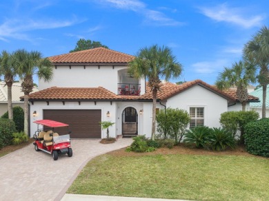 This exquisite custom home, nestled in the secure and golf on Regatta Bay Golf and Country Club in Florida - for sale on GolfHomes.com, golf home, golf lot