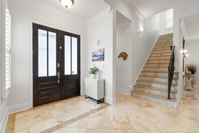 This exquisite custom home, nestled in the secure and golf on Regatta Bay Golf and Country Club in Florida - for sale on GolfHomes.com, golf home, golf lot