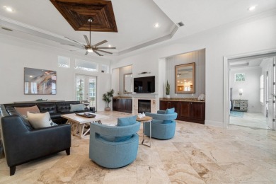 This exquisite custom home, nestled in the secure and golf on Regatta Bay Golf and Country Club in Florida - for sale on GolfHomes.com, golf home, golf lot