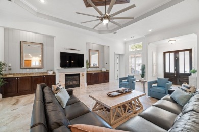 This exquisite custom home, nestled in the secure and golf on Regatta Bay Golf and Country Club in Florida - for sale on GolfHomes.com, golf home, golf lot