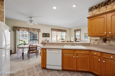 Thia home is light. bright. cozy and comfortable! A Whitney on Carillon Lakes 3 Hole Course in Illinois - for sale on GolfHomes.com, golf home, golf lot