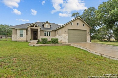 Upgrades galore...10' Ceilings, 8' Doors, Faux Beams in LR on Vaaler Creek Golf Club in Texas - for sale on GolfHomes.com, golf home, golf lot