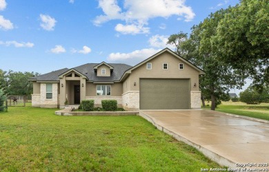 Upgrades galore...10' Ceilings, 8' Doors, Faux Beams in LR on Vaaler Creek Golf Club in Texas - for sale on GolfHomes.com, golf home, golf lot