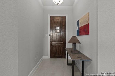 Upgrades galore...10' Ceilings, 8' Doors, Faux Beams in LR on Vaaler Creek Golf Club in Texas - for sale on GolfHomes.com, golf home, golf lot